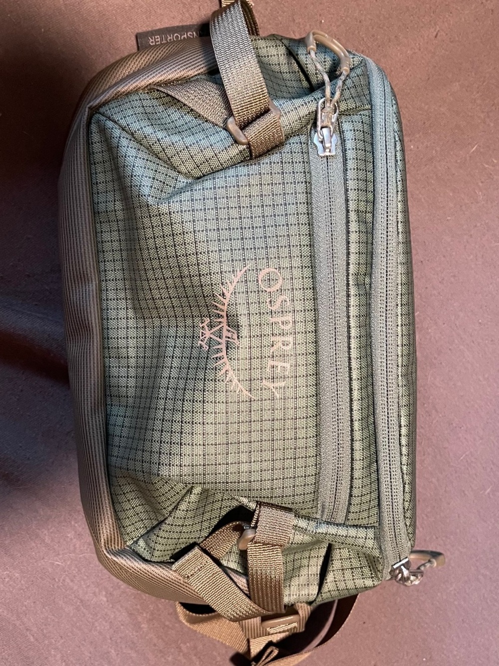 Green Osprey cross body bag